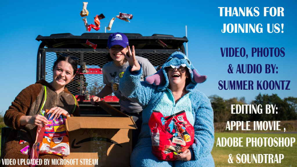 Three women smiling and throwing candy on the back of a Kubota with video credits around the women.