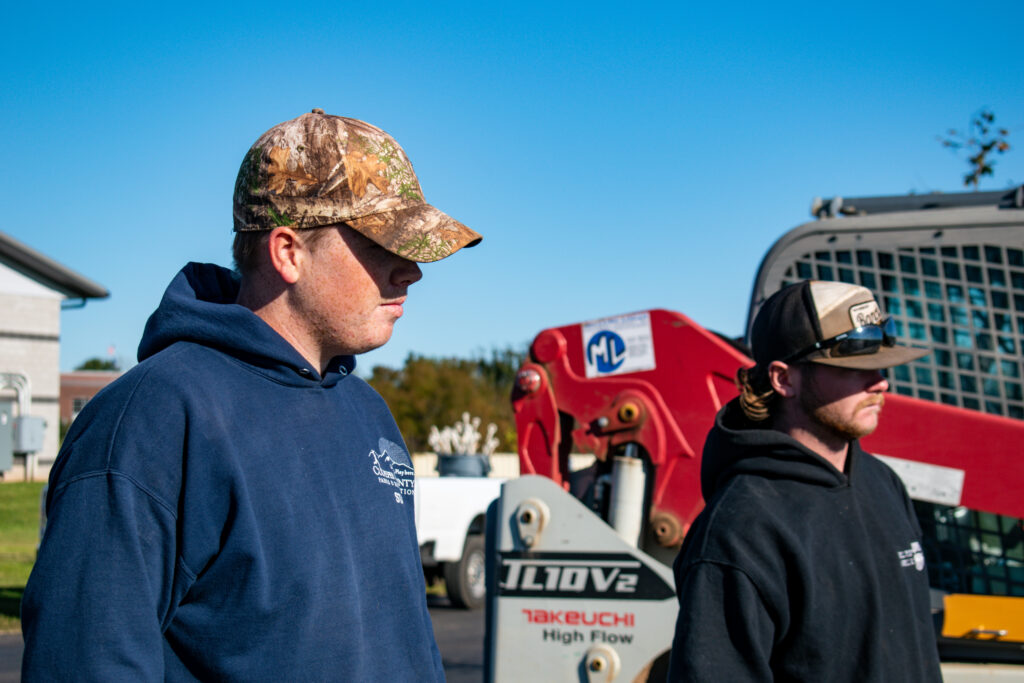 Two men looking to the right.