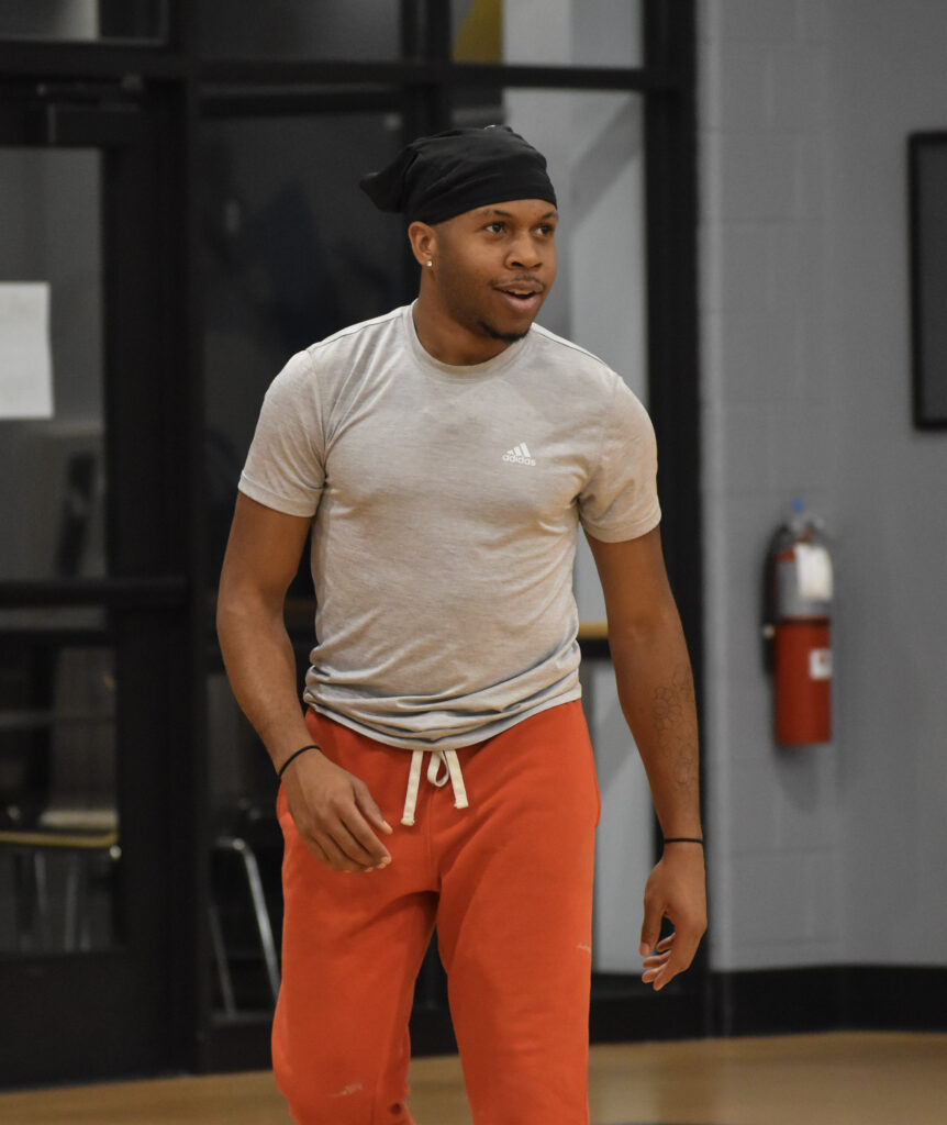 Man walking forward while looking to the right