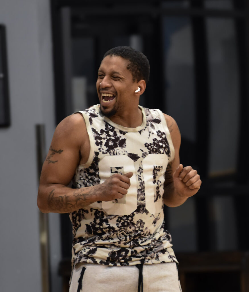 Man looking to the left excited.